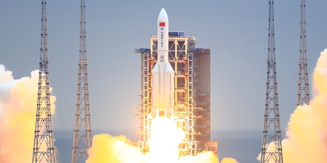 A Long March-5B Y2 rocket blasts off from the Wenchang Spacecraft Launch Site on April 29, 2021, in Wenchang, Hainan province, China.