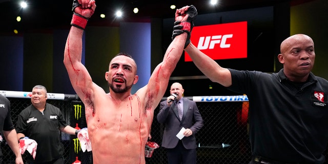 Rafa Garcia reacts after his victory over Maheshate of China in a lightweight fight during the UFC Fight Night event at UFC APEX on December 17, 2022 in Las Vegas, Nevada.