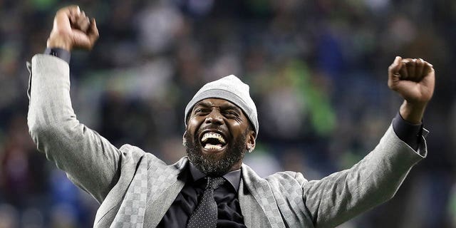 Former NFL player and current ESPN personality Randy Moss reacts during pregame before the game between the Minnesota Vikings and the Seattle Seahawks at CenturyLink Field on Dec. 2, 2019 in Seattle.
