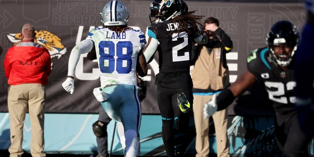 Rayshawn Jenkins (2) of the Jacksonville Jaguars returns a pick-six in overtime to defeat the Dallas Cowboys at TIAA Bank Field on Dec. 18, 2022, in Jacksonville, Florida.