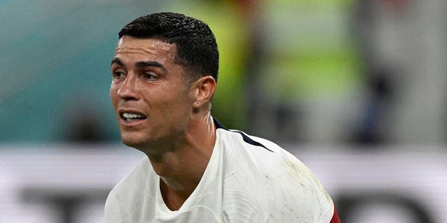 Portugal's forward #07 Cristiano Ronaldo reacts after his team lost the Qatar 2022 World Cup quarter-final football match between Morocco and Portugal at the Al-Thumama Stadium in Doha on December 10, 2022.