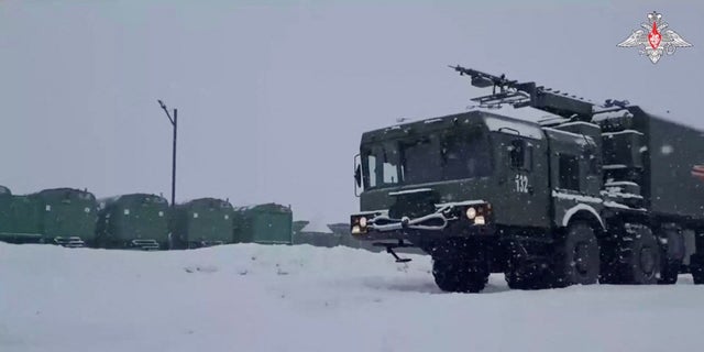 A military vehicle of the Russian Bastion coastal missile system is seen on duty on the Kuril island of Paramushir on Dec. 5, 2022. 