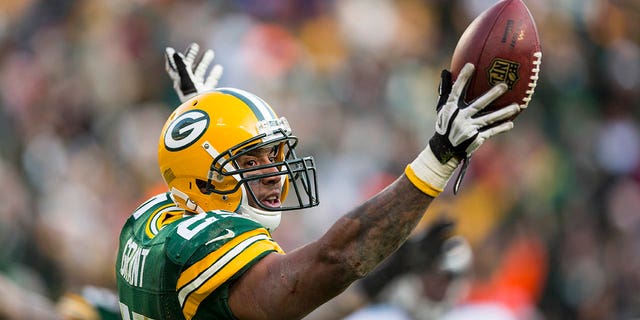 Ryan Grant of the Packers celebrates a touchdown against the Tennessee Titans at Lambeau Field on Dec. 23, 2012, in Green Bay, Wisconsin.