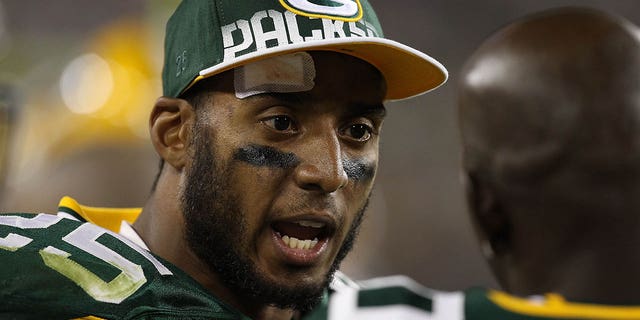 Ryan Grant of the Packers talks with teammate Donald Driver during a preseason game against the Indianapolis Colts at Lambeau Field on Aug. 26, 2010, in Green Bay.