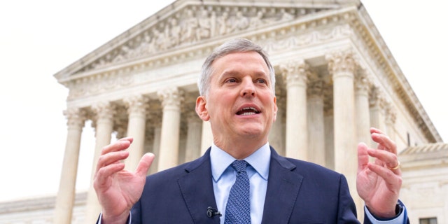 FILE - North Carolina Attorney General Josh Stein speaks in front of the Supreme Court in Washington, on Dec. 7, 2022. 