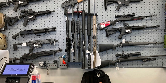 Firearms are displayed at a gun shop in Salem, Oregon, on Feb. 19, 2021.