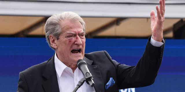 Sali Berisha, the 78-year-old leader of Albania's centre-right Democratic Party, speaks after being attacked during an anti-government protest held near a European Union leaders' summit in Tirana, Albania, December 6, 2022.