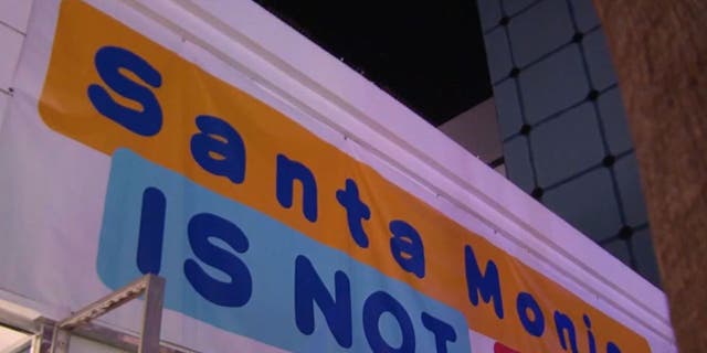 The Santa Monica Coalition posted a sign on the Third Street Promenade that warns shoppers the city is not safe.