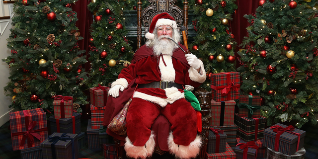 Santa Claus attends an evening hosted by Brooks Brothers to celebrate the holiday with St. Jude Children's Research Hospital at Brooks Brothers in New York City.
