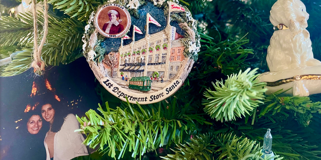 A Christmas tree ornament recognizing James Edgar, a businessman in Brockton, Massachusetts, as the first Santa in a department store in 1890. 
