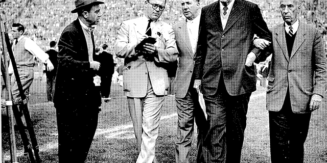 Pudge Heffelfinger was a Paul Bunyan-esque figure from Minnesota. He still towered over other men while being honored at an undated football game later in life. He continued to play football until his mid 60s.