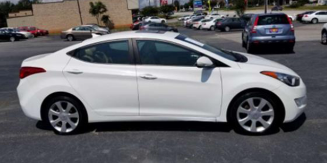 Stock photo of a white 2011-2013 Hyundai Elantra, which police are seeking in the investigation of four college students' murders last month in Idaho.