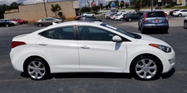 Stock photo of a white 2011-2013 Hyundai Elantra, which police are seeking in the investigation of four college students' murders last month. 