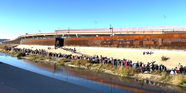 Migrants cross the southern border in El Paso, Texas.