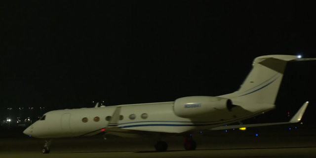 A plane carrying WNBA star Brittney Griner lands in San Antonio.