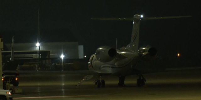 A plane carrying WNBA star Brittney Griner arrives in Texas on Dec. 9, 2022.