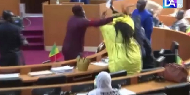 Massata Samb, according to Reuters, is seen slapping Amy Ndiaye Gniby of the Benno Bokk Yakaar coalition.