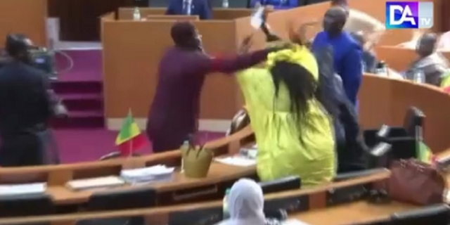 Massata Samb, according to Reuters, is seen slapping Amy Ndiaye Gniby of the Benno Bokk Yakaar coalition.