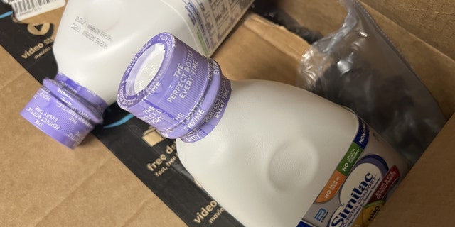 Bottles of Similac baby formula from Abbott Laboratories are visible in a shipment box, in Lafayette, California, May 13, 2022. Shortages of baby formula were reported in early 2022. 