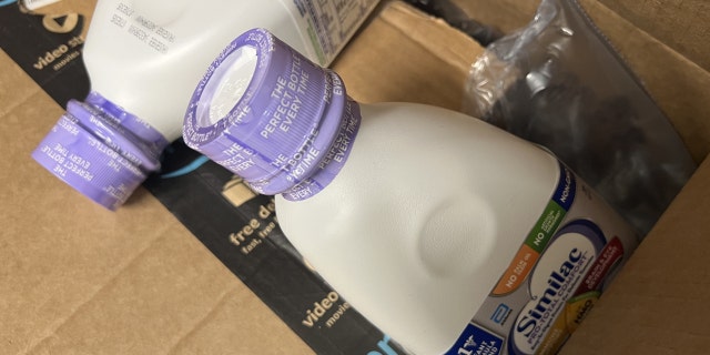 Bottles of Similac baby formula from Abbott Laboratories are visible in a shipment box, in Lafayette, California, May 13, 2022. Shortages of baby formula were reported in early 2022.