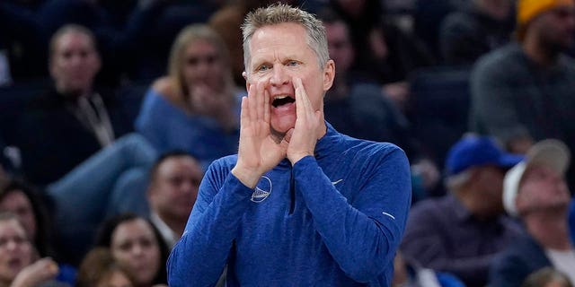 Golden State Warriors coach Steve Kerr yells at players during the first half of a game against the Los Angeles Clippers in San Francisco on November 23, 2022. 