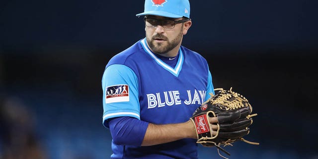 TJ House, #44 of the Toronto Blue Jays, looks in before delivering a pitch in the ninth inning during MLB game action against the Minnesota Twins at Rogers Center on Aug.  25, 2017 in Toronto.