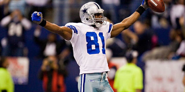Terrell Owens of the Dallas Cowboys celebrates after scoring a touchdown against the Seattle Seahawks at Texas Stadium on November 27, 2008 in Irving, Texas.