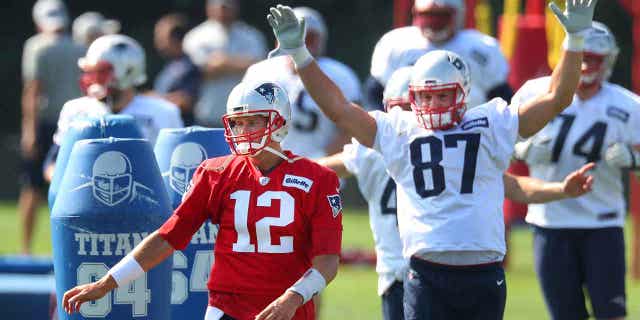 Tom Brady warming up at practice with future Hall of Fame tight end Rob "Gronk" Gronkowski.