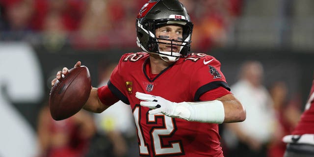 Tampa Bay Buccaneers quarterback Tom Brady (12) drops back to pass in the first half of an NFL football game against the New Orleans Saints in Tampa, Fla., Monday, Dec. 5, 2022. 