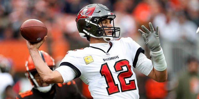 Tampa Bay Buccaneers quarterback Tom Brady (12) throws a pass during the second half of a game against the Cleveland Browns in Cleveland Nov. 27, 2022. 
