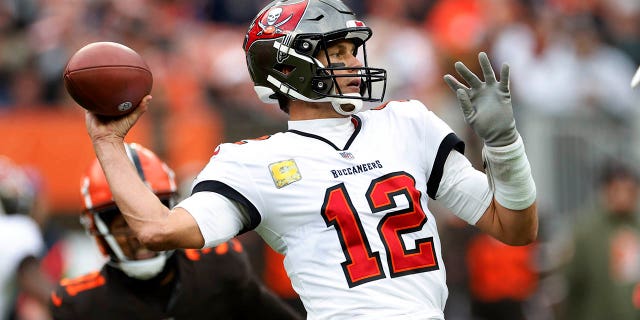Tampa Bay Buccaneers quarterback Tom Brady (12) throws a pass during the second half of a game against the Cleveland Browns in Cleveland on November 27, 2022.