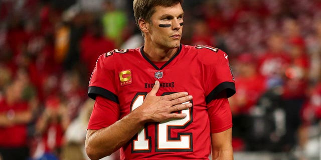Tom Brady #12 of the Tampa Bay Buccaneers stretches before an NFL football game against the New Orleans Saints at Raymond James Stadium on December 5, 2022 in Tampa, Florida.