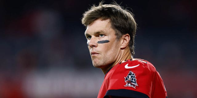 Tampa Bay Buccaneers quarterback Tom Brady, #12, looks on prior to the game against the New Orleans Saints at Raymond James Stadium in Tampa, Florida, Dec. 5, 2022.