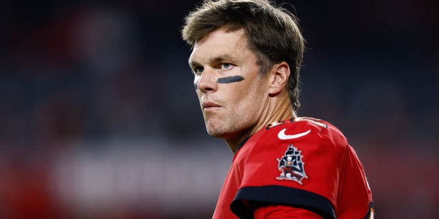 Tampa Bay Buccaneers quarterback Tom Brady, #12, looks on prior to the game against the New Orleans Saints at Raymond James Stadium in Tampa, Florida, Dec. 5, 2022.