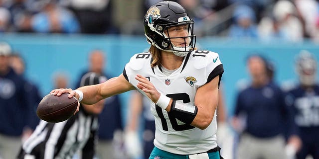 Jacksonville Jaguars quarterback Trevor Lawrence throws during the first half of an NFL football game against the Tennessee Titans Sunday, Dec. 11, 2022, in Nashville, Tenn.
