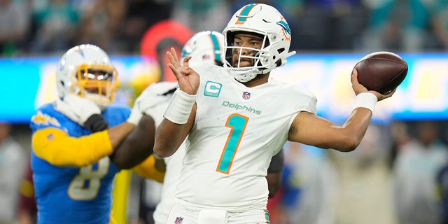 Miami Dolphins quarterback Tua Tagovailoa (1) throws during the first half of an NFL football game against the Los Angeles Chargers on Sunday, December 11, 2022 in Inglewood, California. 