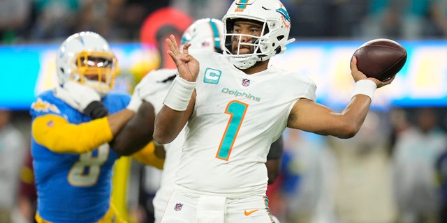 Miami Dolphins quarterback Tua Tagovailoa (1) throws during the first half of an NFL football game against the Los Angeles Chargers on Sunday, December 11, 2022 in Inglewood, California. 