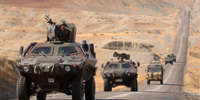 A Turkish military vehicle ran over a woman and child in Syria, killing them. Pictured is a Turkish army convoy heads toward Sirnak on the Turkey-Iraq border on Oct. 22, 2007, near Sirnak, Turkey.