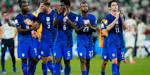 US players celebrate after their World Cup Group B match against Iran at Al Thumama Stadium in Doha, Qatar, November 29, 2022.