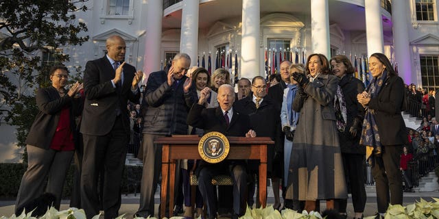 WASHINGTON, DC - DECEMBER 13: U.S. President Joe Biden reacts after signing the Respect for Marriage Act on the South Lawn of the White House on December 13, 2022 in Washington, DC. 