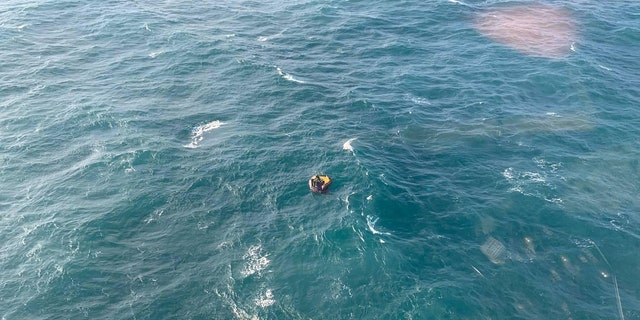 This is the heartwarming moment when a missing Thai seaman, Chananyu Kansriya, was found adrift on a life raft on Tuesday afternoon.