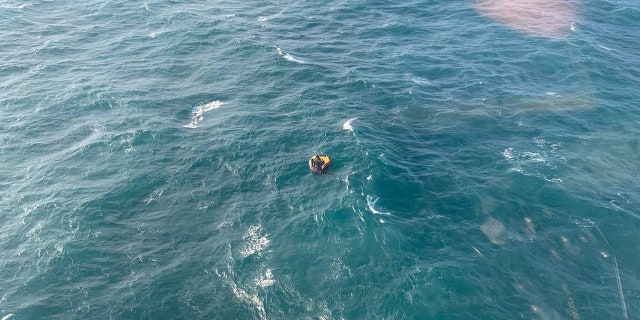 This is the heartwarming moment a missing Thai sailor, Chananyu Kansriya, was found floating on a life raft Tuesday afternoon.