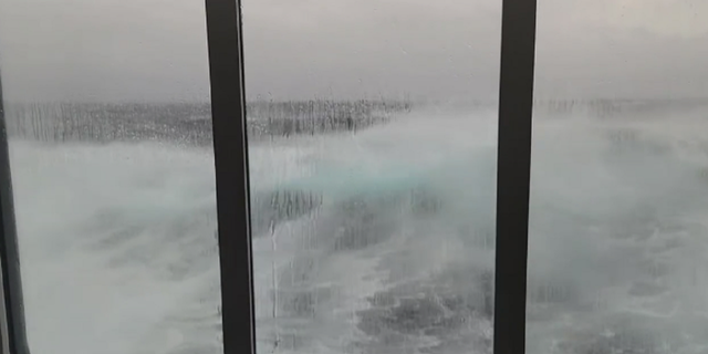 Waves are seen crashing alongside the Viking Polaris cruise ship while it recently was sailing in the Drake Passage.