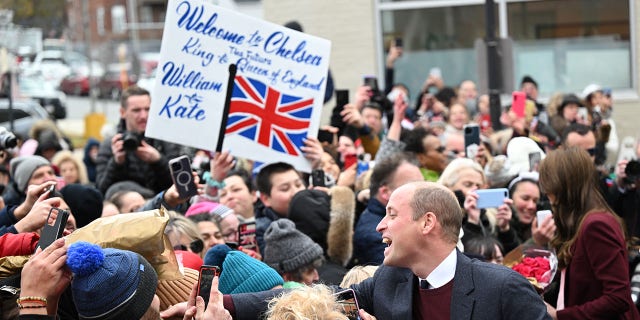 Prince William and Kate Middleton spent at least 10 minutes talking to fans outside a nonprofit in Chelsea, Mass., Thursday. 