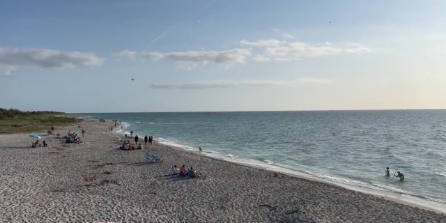 The body of a woman and a child have been found, rescue officials say.