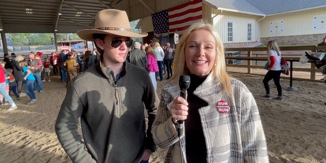 Supporters of Georgia Senate nominee Herschel Walker speak with Fox News Digital at a rally in Milton, Georgia on November 21, 2022.