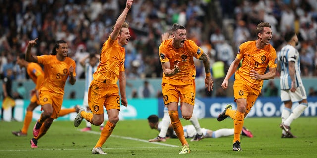 LUSAIL CITY, QATAR - DECEMBER 09: Wout Weghorst of Netherlands celebrates after scoring the team's second goal during the FIFA World Cup Qatar 2022 quarter final match between Netherlands and Argentina at Lusail Stadium on December 09, 2022 in Lusail City, Qatar.