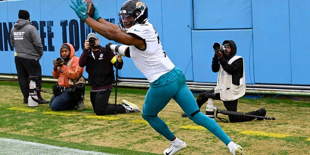 Jacksonville Jaguars wide receiver Zay Jones celebrates after scoring against the Tennessee Titans Sunday, Dec. 11, 2022, in Nashville.