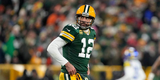 Aaron Rodgers #12 of the Green Bay Packers looks on during the game against the Los Angeles Rams at Lambeau Field on December 19, 2022 in Green Bay, Wisconsin. 