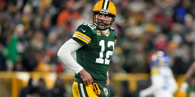 Aaron Rodgers #12 of the Green Bay Packers looks on during the game against the Los Angeles Rams at Lambeau Field on December 19, 2022 in Green Bay, Wisconsin.